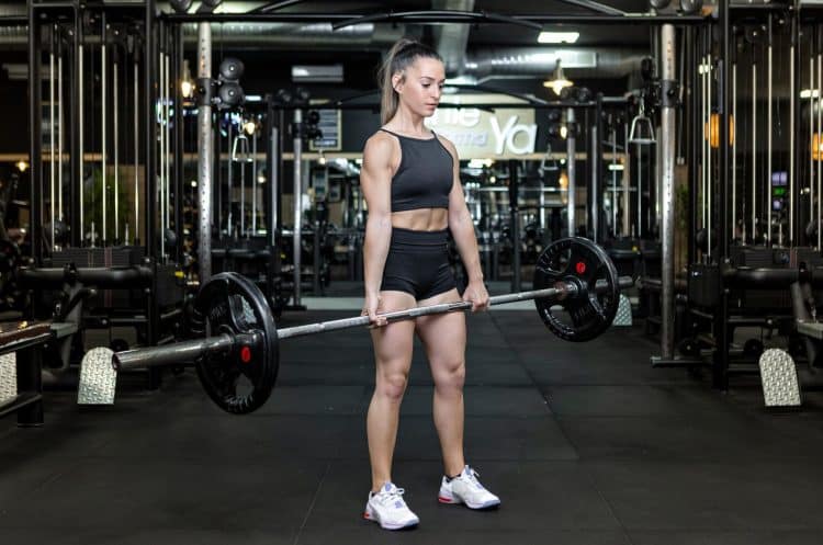 Woman Doing Deadlift In Gym